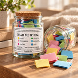 Bible verses jar with cork lid and colorful verse cards on a wooden table
