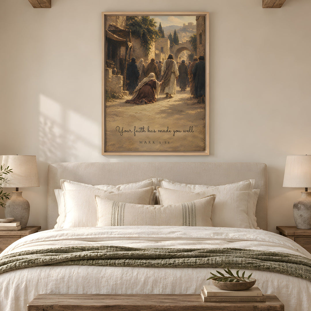 A framed art print featuring an ancient scene with the text 'If your faith has made you weak, MAN AS A TREE IS NOT NEEDED; SO FAR AS IS NEEDED, MAN WAS NOT NEEDED' from Hebrews 12:13, displayed on a neutral wall above a beautifully made bed in a warm, modern bedroom.