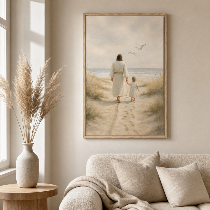 Jesus and Child framed canvas wall art styled above a beige boucle sofa in a warm living room