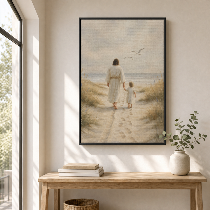 Jesus and Child framed canvas wall art displayed above a light oak console in a bright entryway