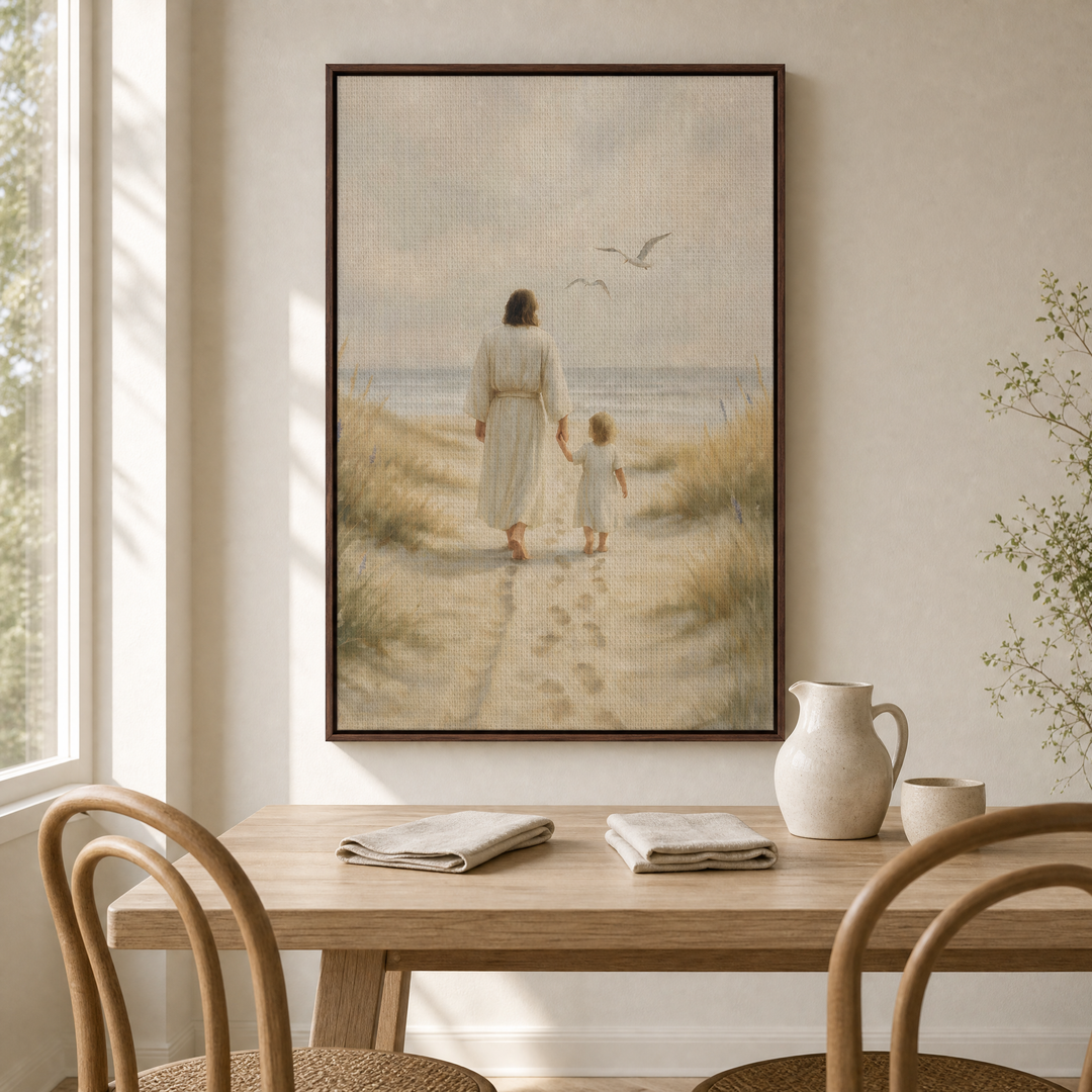 Jesus and Child framed canvas wall art above a light wood dining table in an airy dining nook