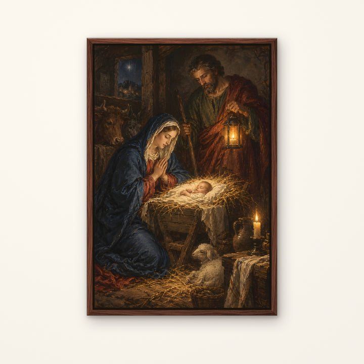 A framed religious art print depicting the Holy Family in a rustic stable, with Mary kneeling beside a baby in a manger, Joseph holding a lantern, and a small dog at the bottom right. The artwork is housed in a dark brown wooden frame and is displayed against a clean, off-white background.