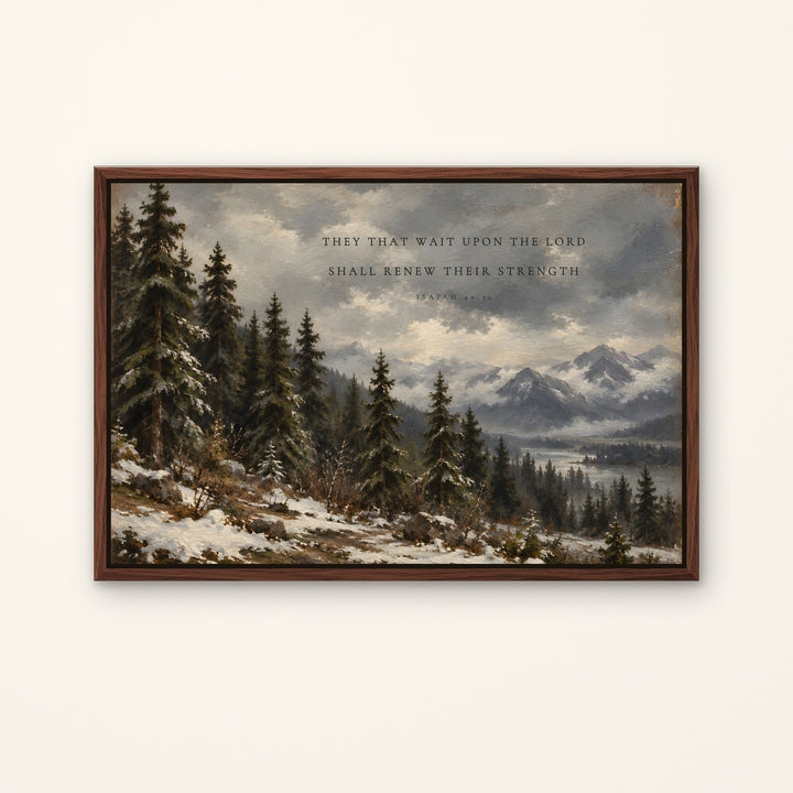 A framed landscape art print featuring a snowy pine forest, distant mountains, and a cloudy sky with the text, 'THEY THAT WAIT UPON THE LORD SHALL RENEW THEIR STRENGTH Psalm 34:5-6'. The artwork is housed in a dark brown wooden frame and is displayed against a clean, off-white background.