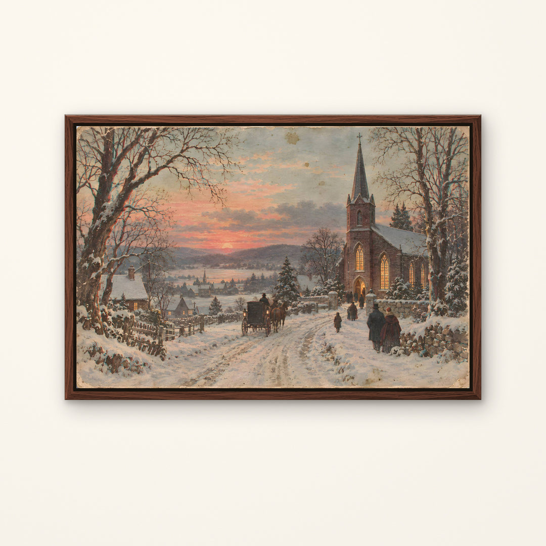 A framed winter landscape painting hangs on a light beige wall. The artwork depicts a snowy village street with bare trees, a church steeple, horse-drawn carriage, and figures near warm glowing windows under a sunset sky.