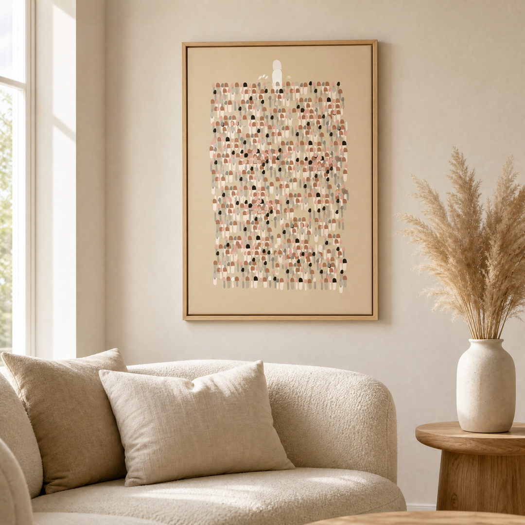 Jesus Leaves The 99 framed canvas wall art styled above a beige boucle sofa in a warm living room